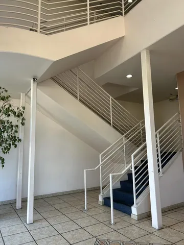 a view of street with parked cars