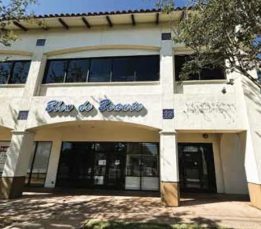 a view of a car garage with a chair