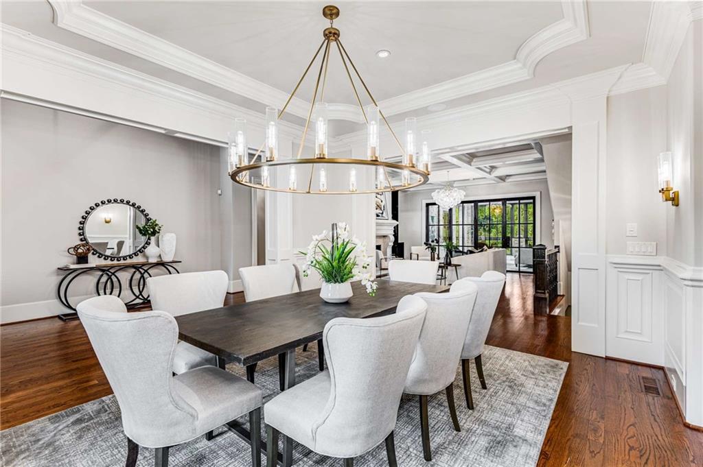 56 Mt Paran Road Northwest Atlanta, GA 30327 - Photo 17 of 52 a view of a dining room with furniture window and wooden floor