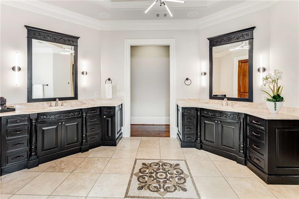 56 Mt Paran Road Northwest Atlanta, GA 30327 - Photo 21 of 52 a spacious bathroom with a granite countertop sink and a mirror