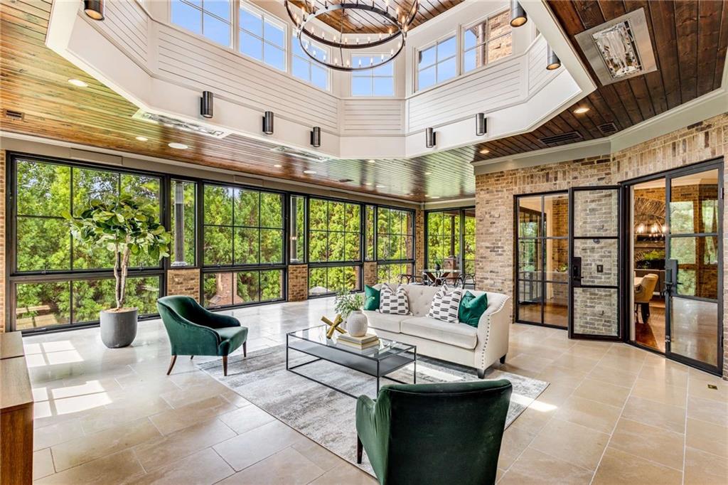 56 Mt Paran Road Northwest Atlanta, GA 30327 - Photo 24 of 52 a living room with furniture and a large window