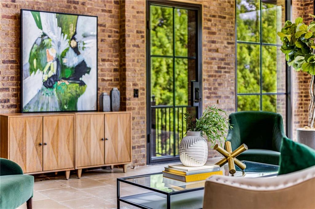 56 Mt Paran Road Northwest Atlanta, GA 30327 - Photo 25 of 52 a living room filled with furniture and a potted plant