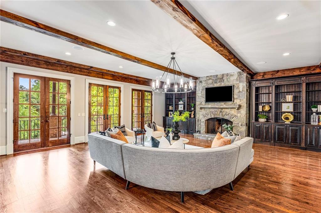56 Mt Paran Road Northwest Atlanta, GA 30327 - Photo 27 of 52 a living room with furniture and a flat screen tv