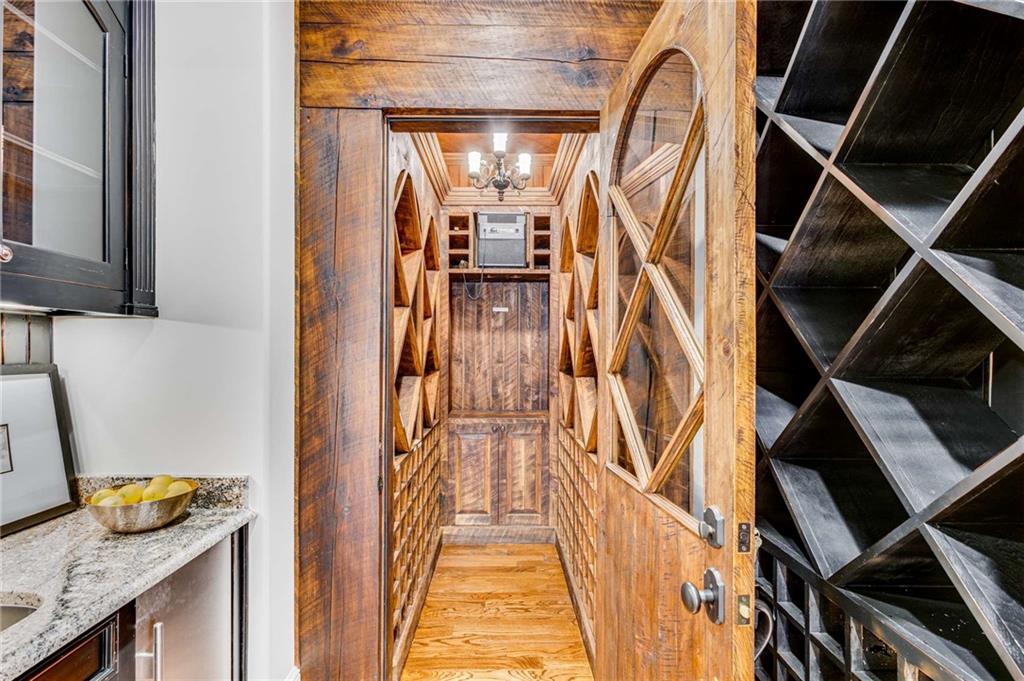 56 Mt Paran Road Northwest Atlanta, GA 30327 - Photo 32 of 52 a view of walk in closet with wooden floor
