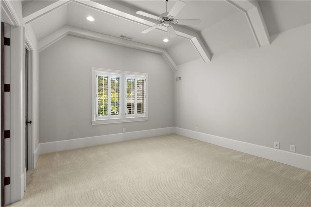 56 Mt Paran Road Northwest Atlanta, GA 30327 - Photo 37 of 52 an empty room with windows and fan