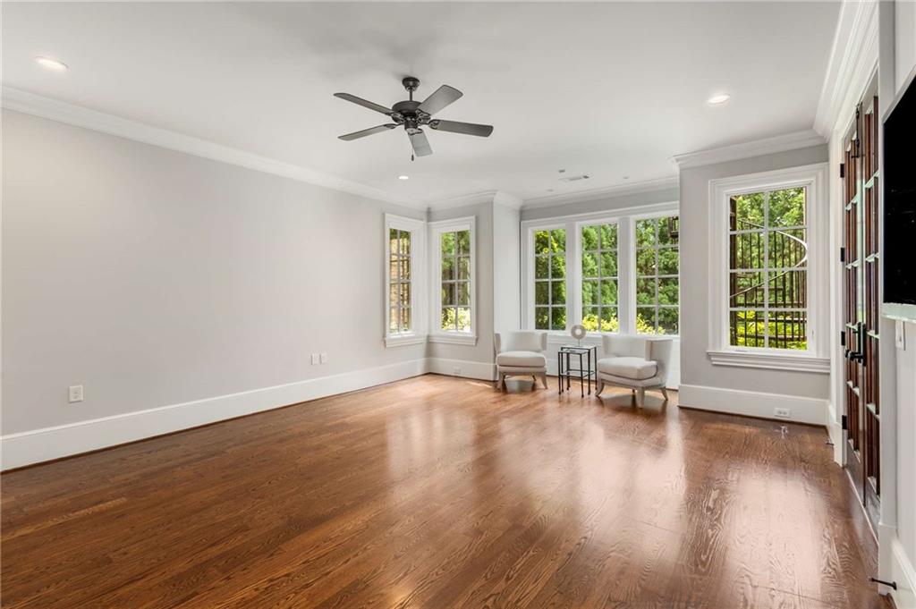 56 Mt Paran Road Northwest Atlanta, GA 30327 - Photo 44 of 52 a view of an empty room with a window and wooden floor