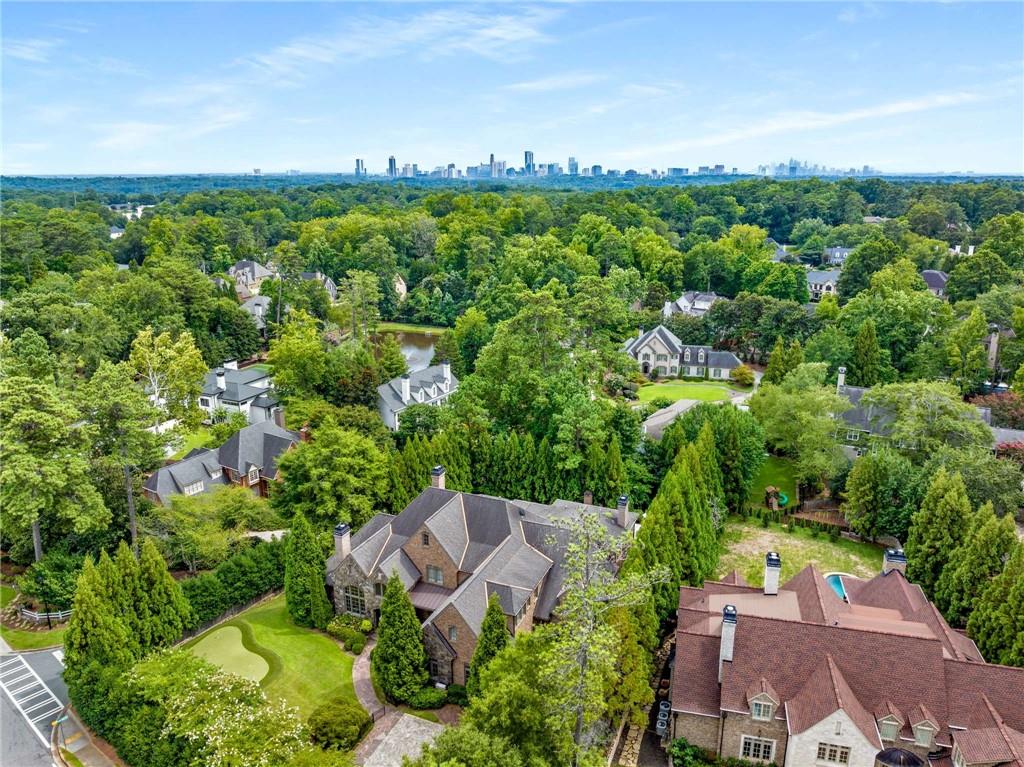56 Mt Paran Road Northwest Atlanta, GA 30327 - Photo 52 of 52 an aerial view of a house with a yard