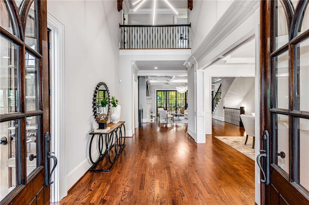 56 Mt Paran Road Northwest Atlanta, GA 30327 - Photo 7 of 52 a view of an entryway with wooden floor and a livingroom view