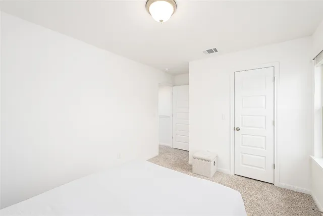 a view of a backyard with entertaining space