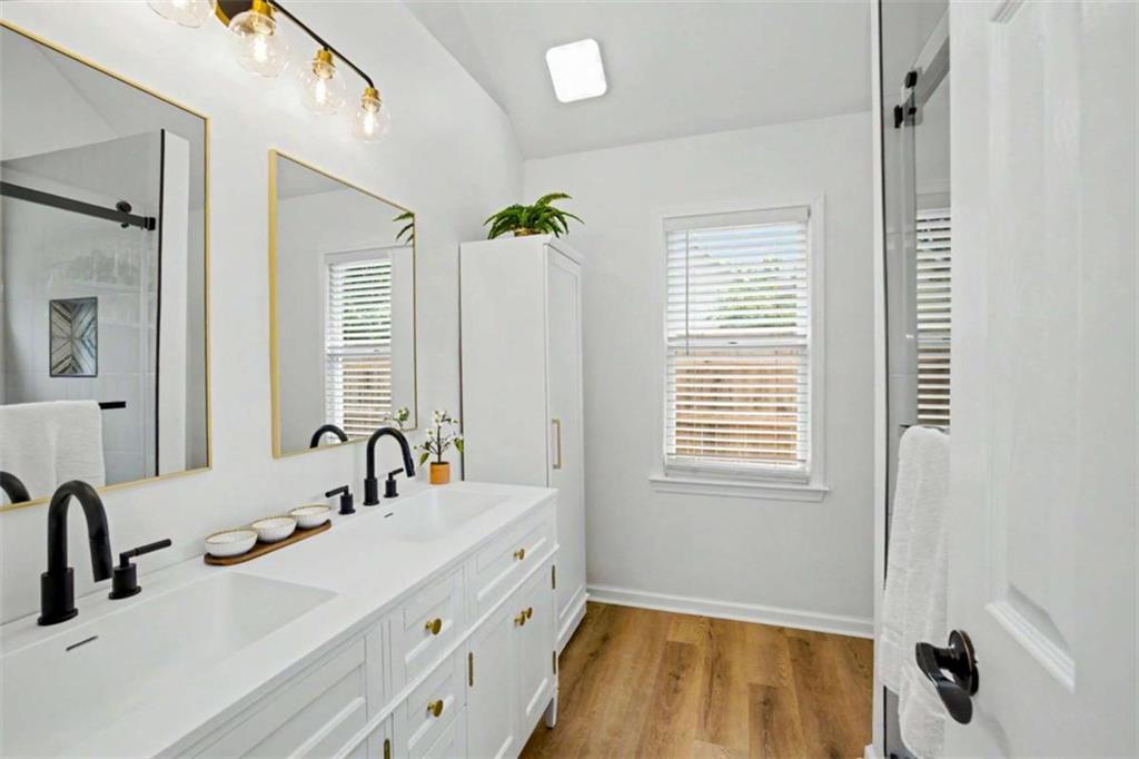 146 Jeb Stuart Drive Newnan, GA 30265 - Photo 20 of 33 a bathroom with a sink and a mirror