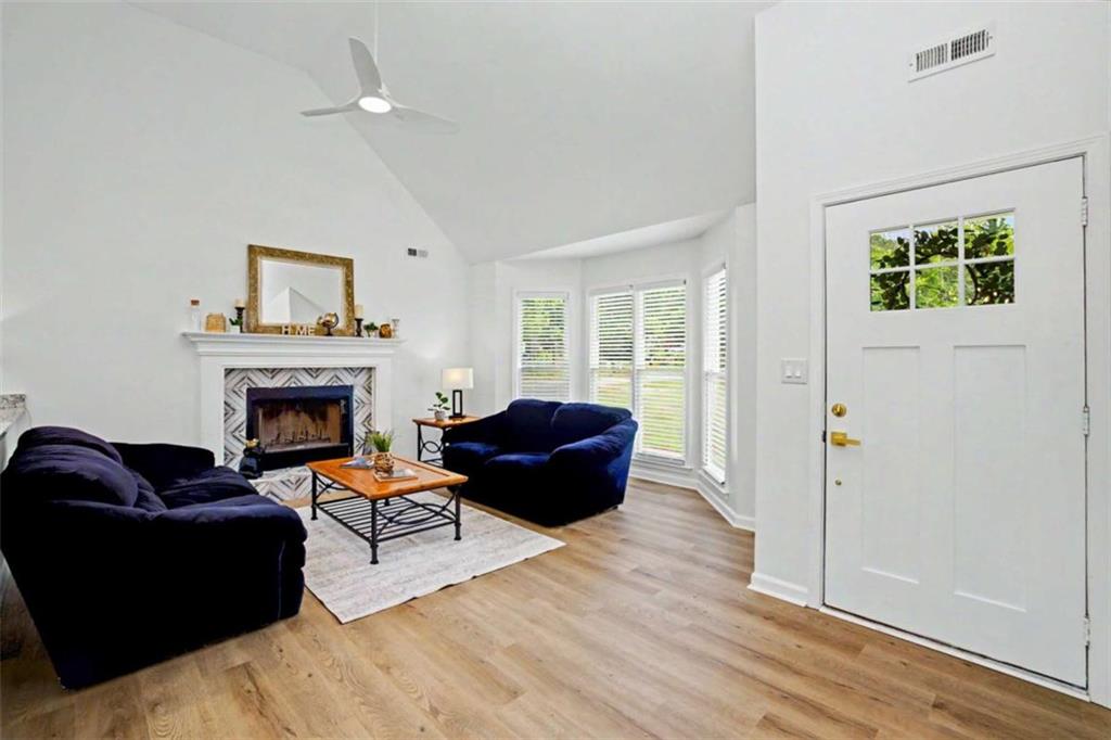 146 Jeb Stuart Drive Newnan, GA 30265 - Photo 5 of 33 a living room with furniture and a fireplace