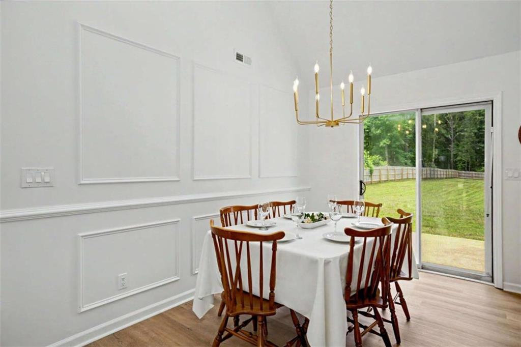 146 Jeb Stuart Drive Newnan, GA 30265 - Photo 9 of 33 a view of a dining room with furniture window and outside view