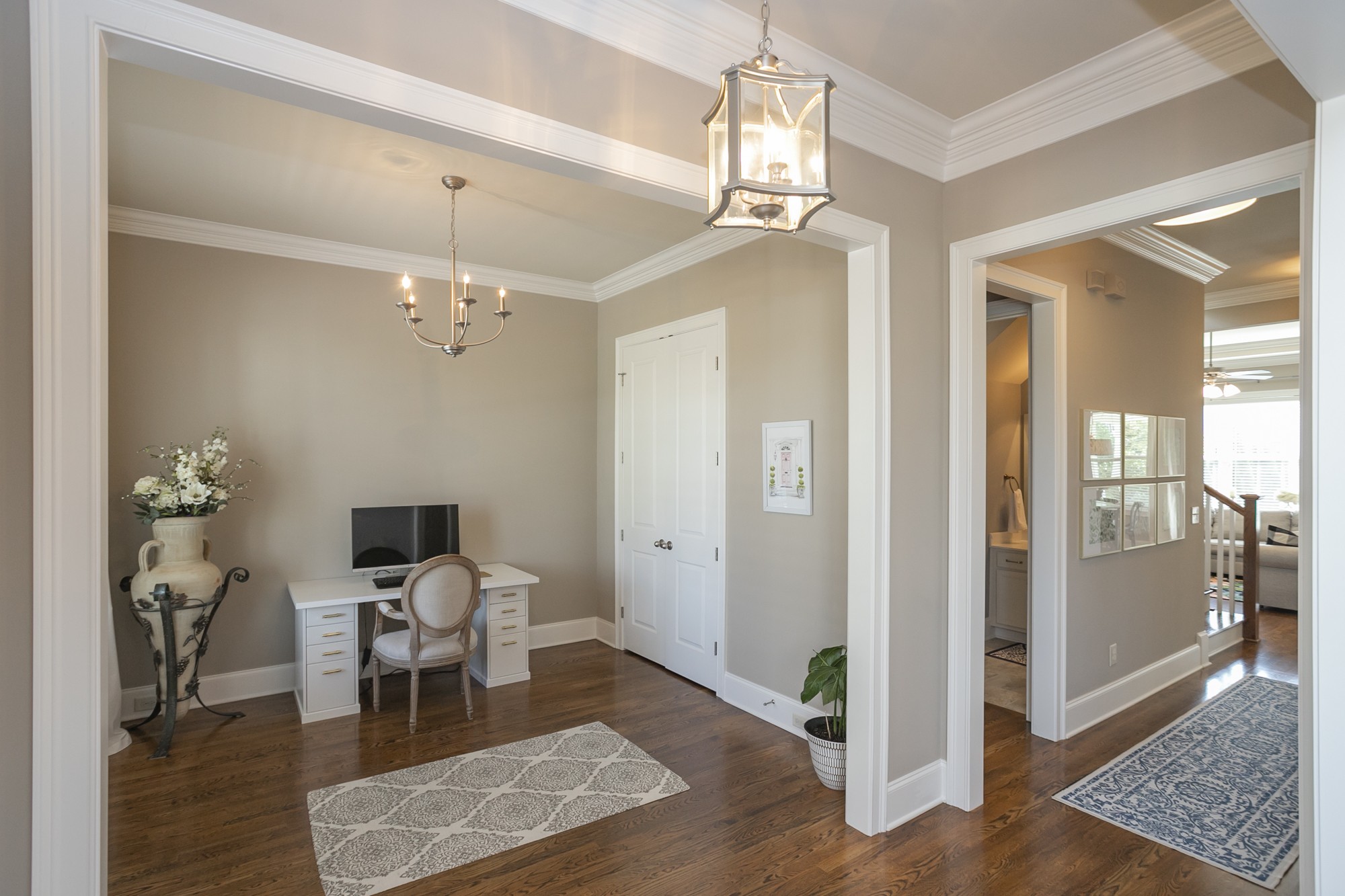 431 Avon River Road Franklin, TN 37064 - Photo 12 of 33 a living room with furniture and a chandelier