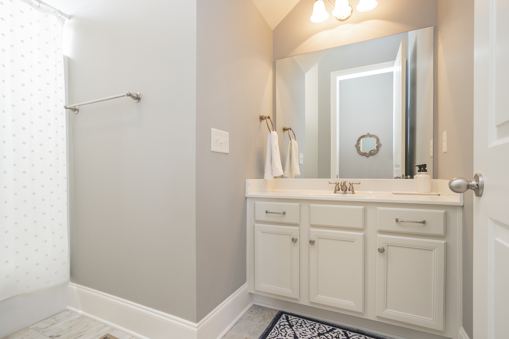 431 Avon River Road Franklin, TN 37064 - Photo 13 of 33 a bathroom with a sink and a mirror