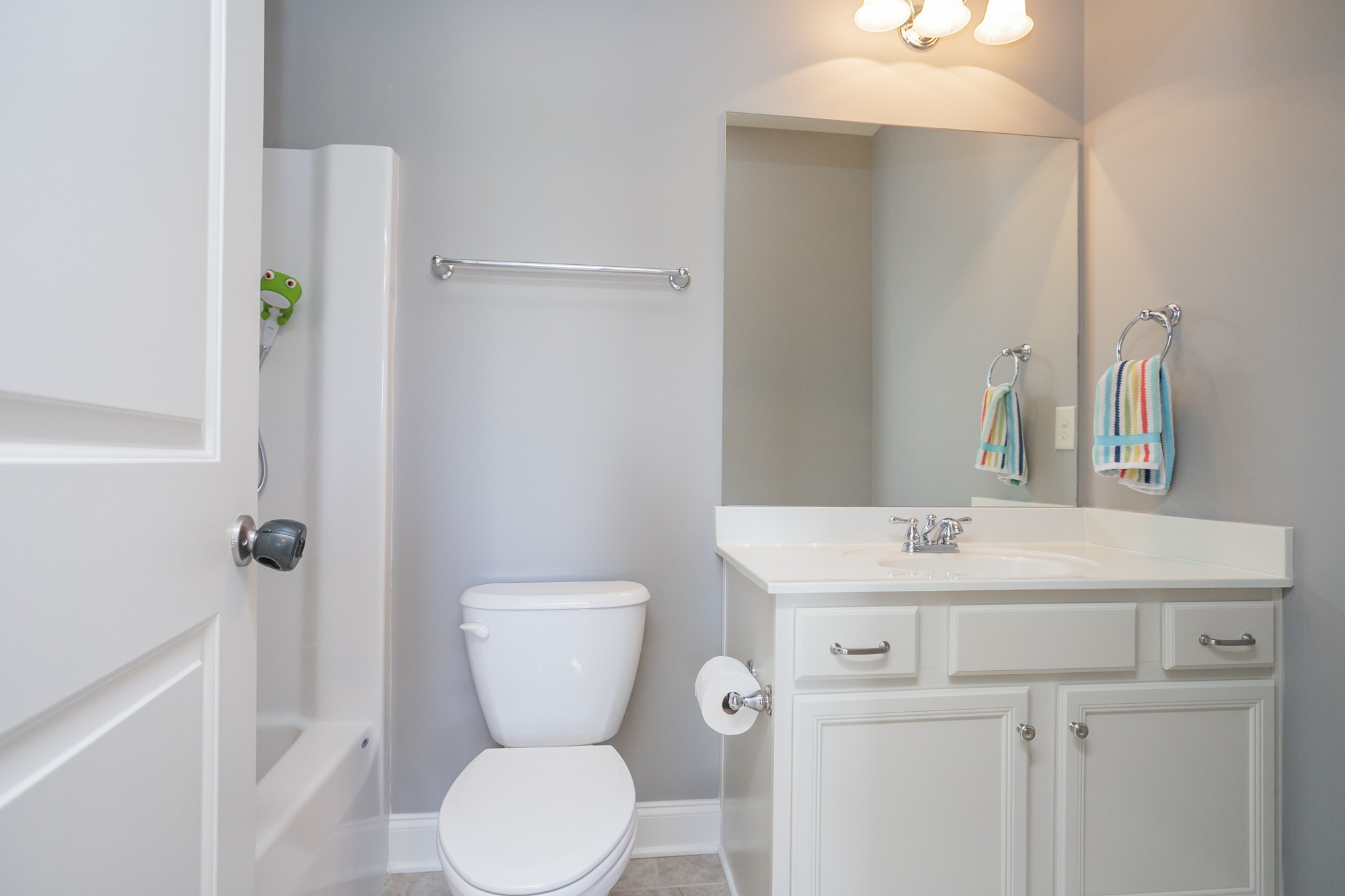 431 Avon River Road Franklin, TN 37064 - Photo 17 of 33 a bathroom with a toilet sink and mirror