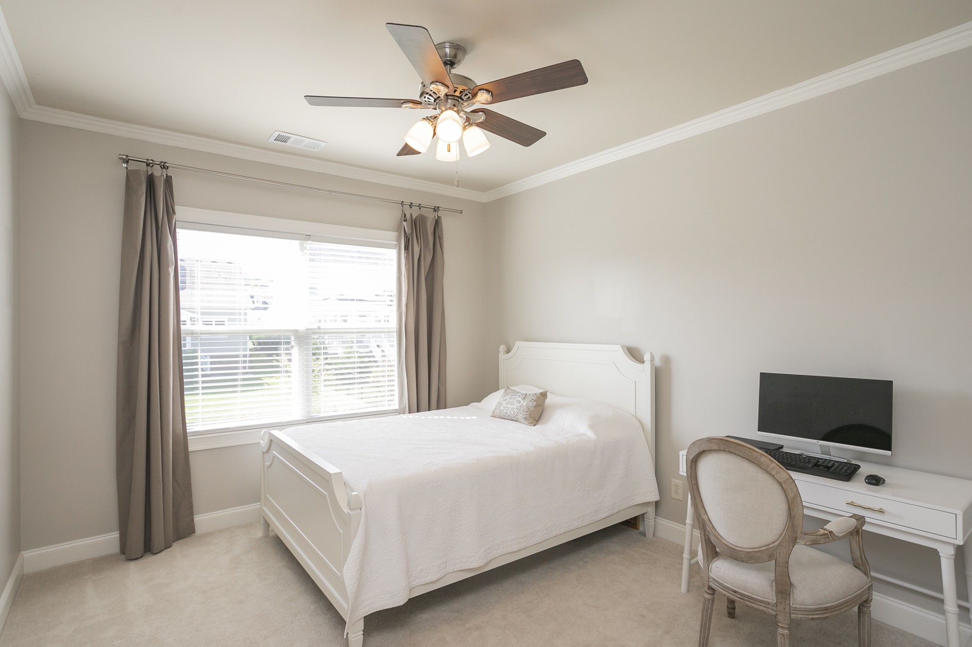 431 Avon River Road Franklin, TN 37064 - Photo 21 of 33 a bedroom with a bed and a chair with the outer view