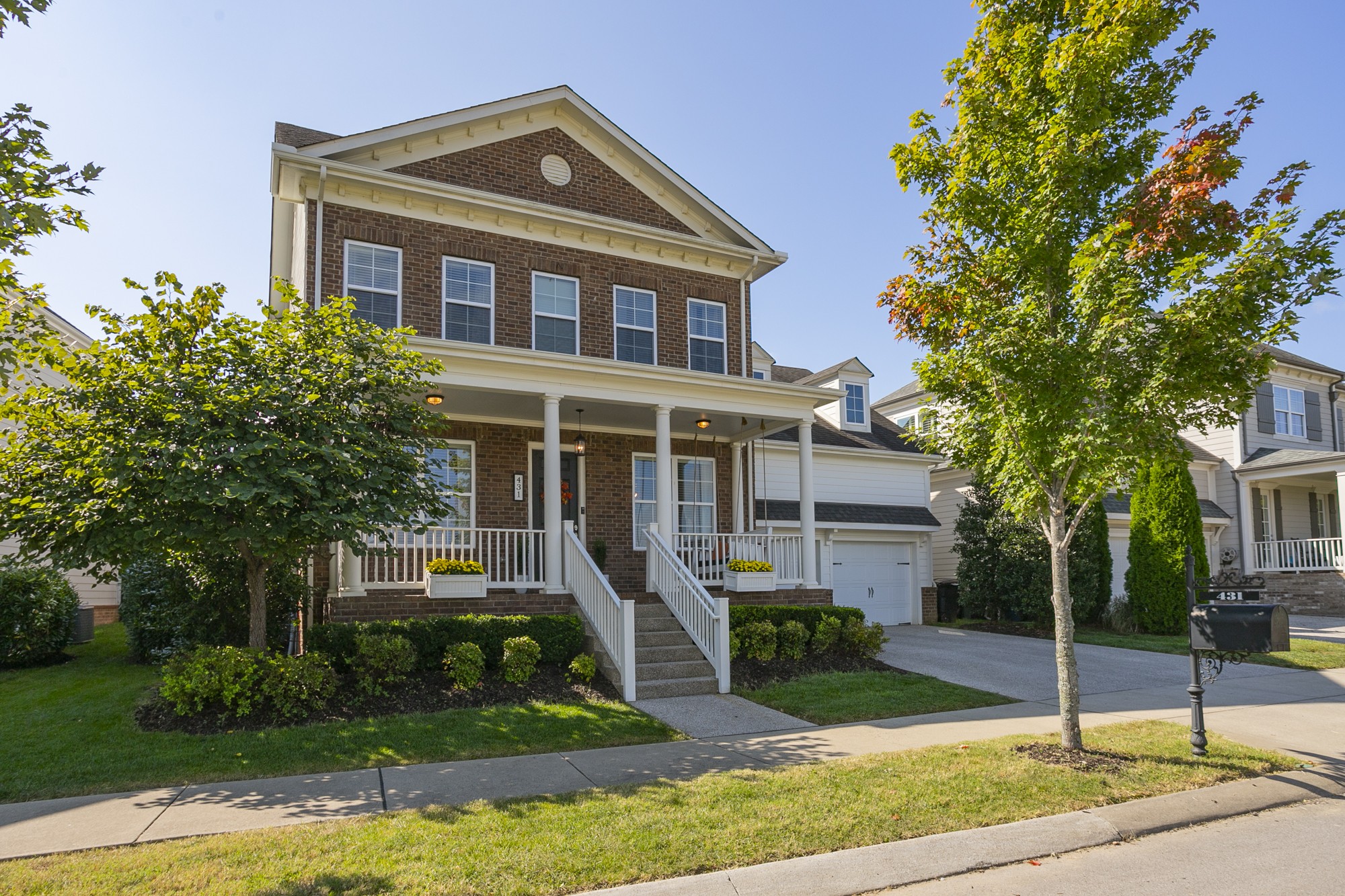 431 Avon River Road Franklin, TN 37064 - Photo 28 of 33 a front view of a house with garden