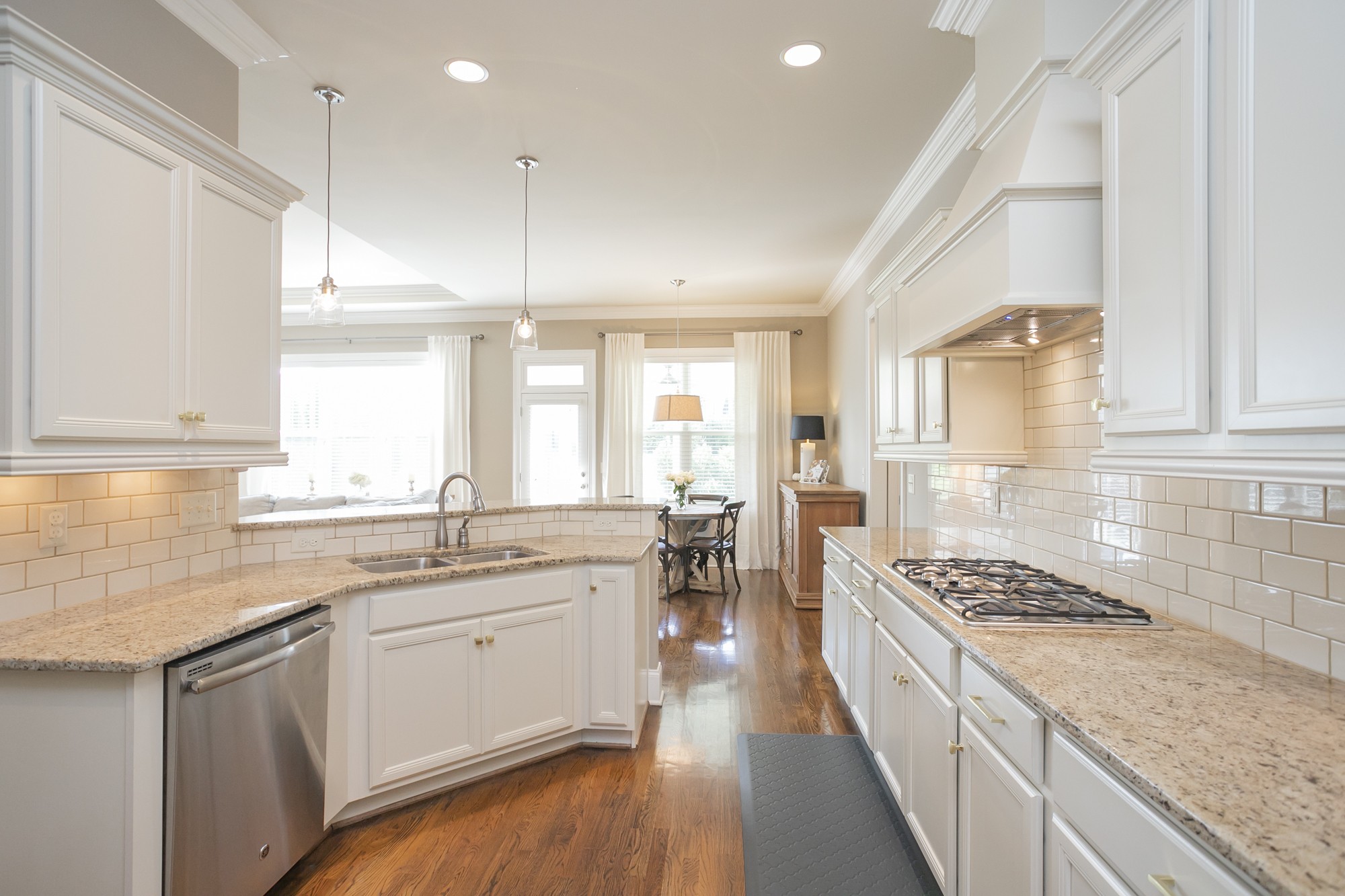 431 Avon River Road Franklin, TN 37064 - Photo 7 of 33 a kitchen with a sink stove and cabinets