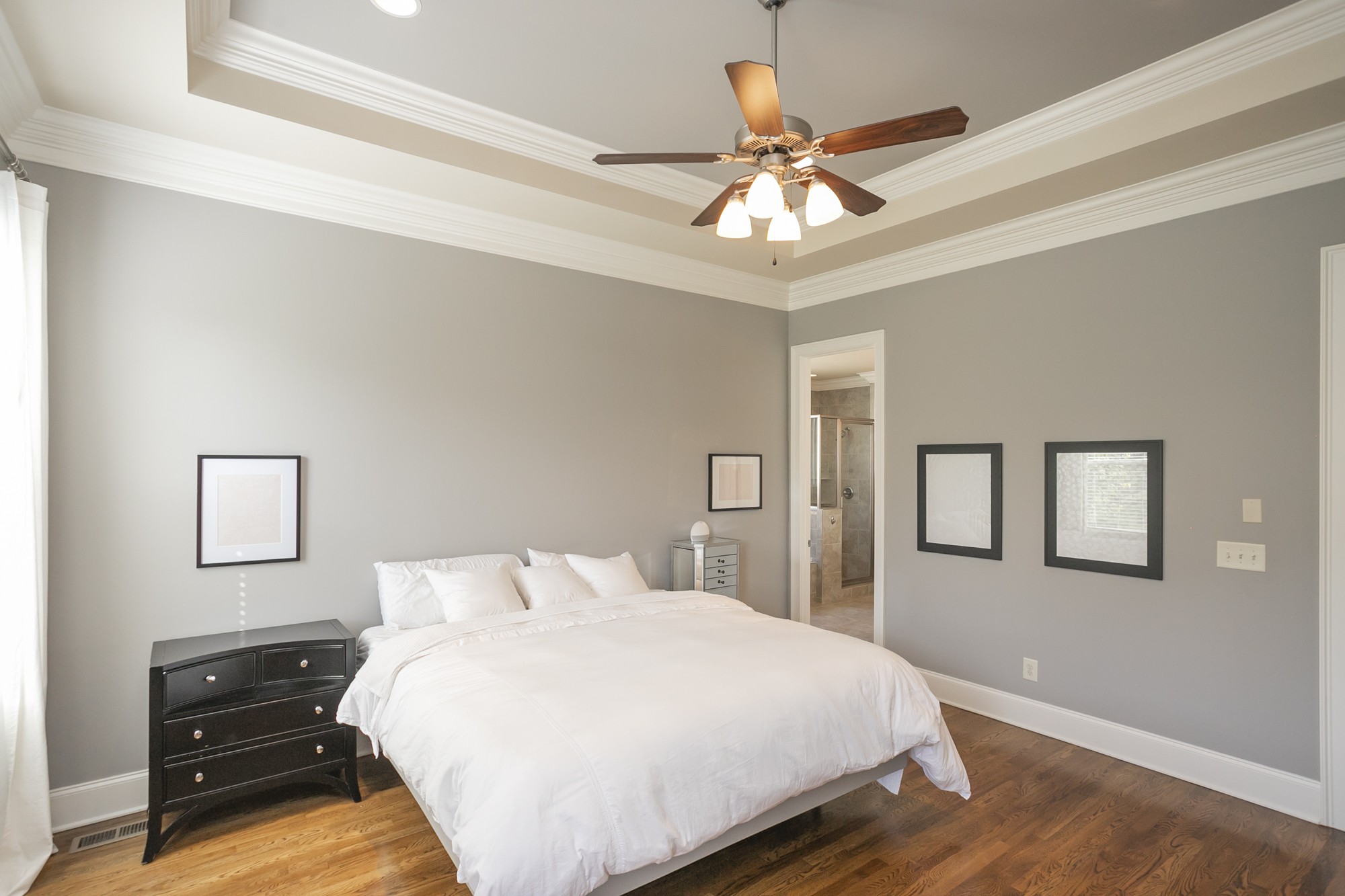 431 Avon River Road Franklin, TN 37064 - Photo 8 of 33 a bedroom with a large bed and a chandelier