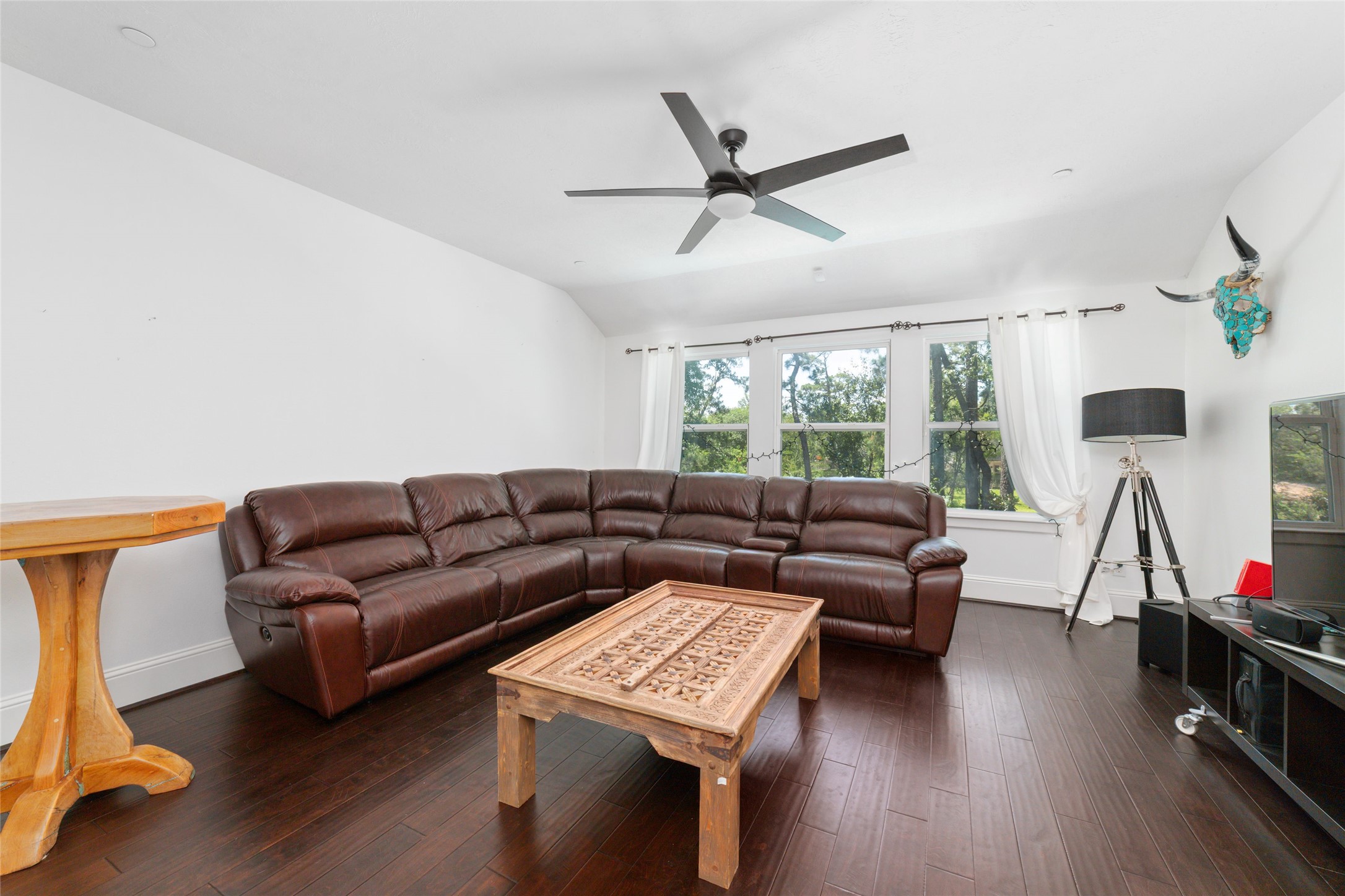 335 Voss Road Houston, TX 77024 - Photo 33 of 45 a living room with furniture and a window