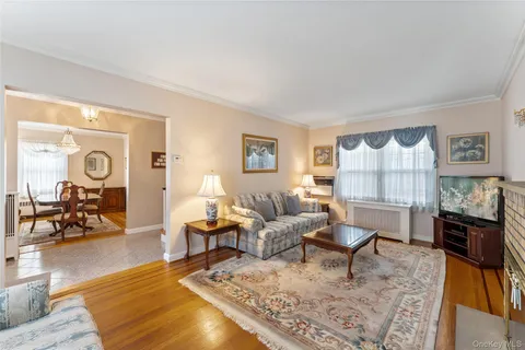 a living room with furniture and a table