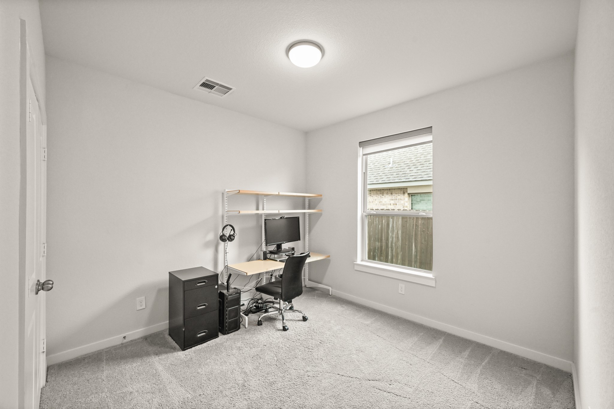 5010 Chestnut Orchard Drive Houston, TX 77066 - Photo 19 of 31 a living room with furniture and a window