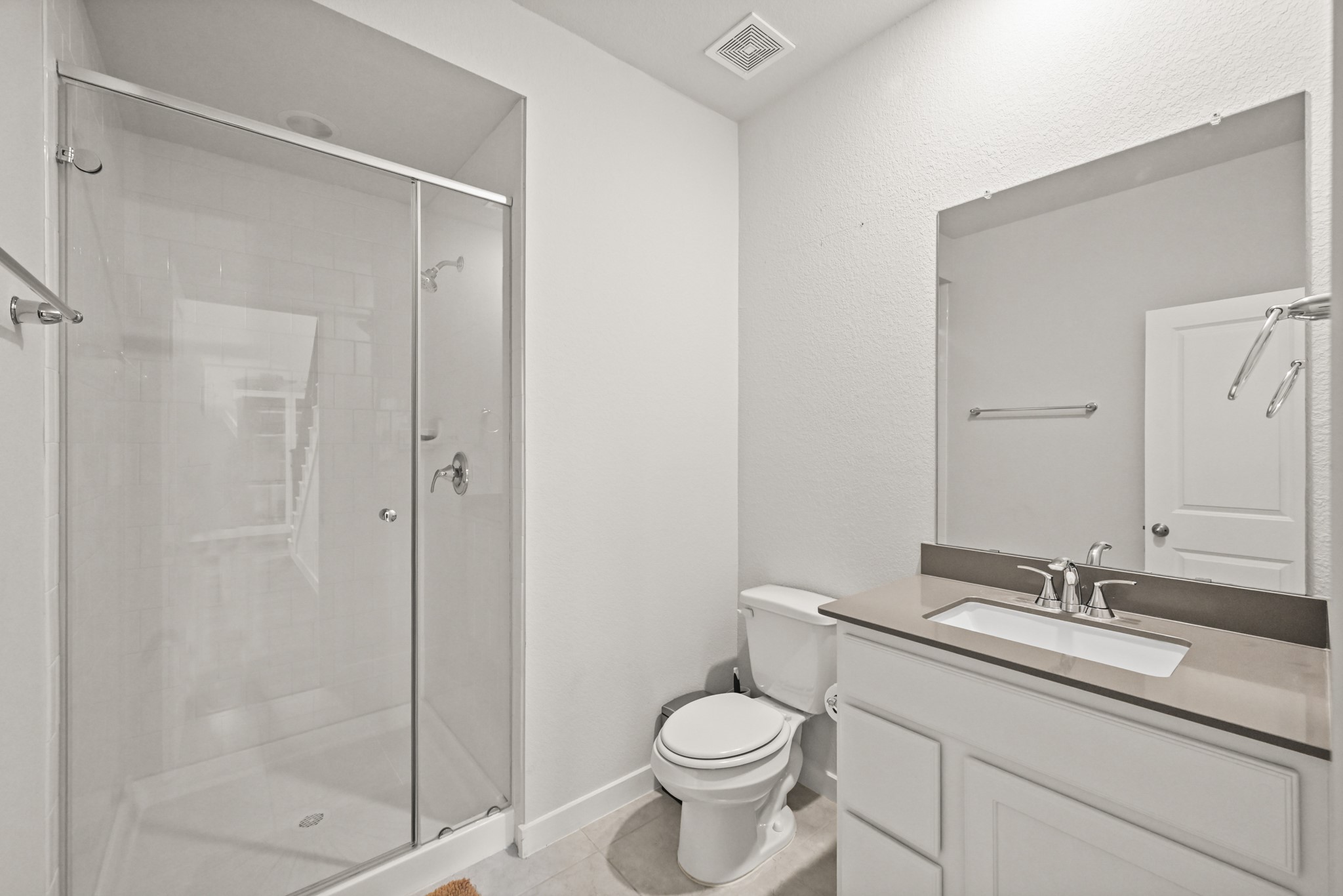 5010 Chestnut Orchard Drive Houston, TX 77066 - Photo 20 of 31 a bathroom with a granite countertop sink toilet and shower