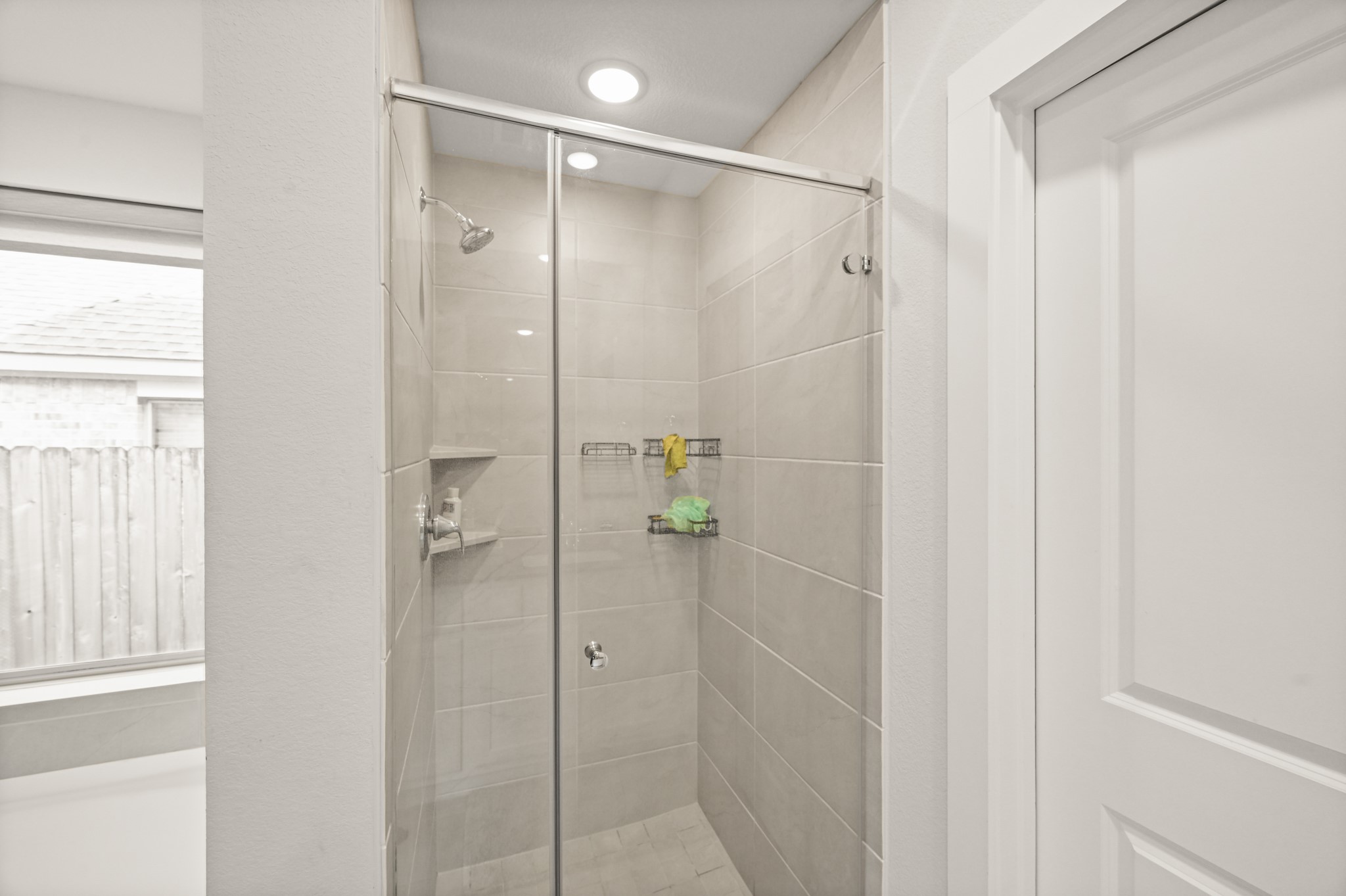 5010 Chestnut Orchard Drive Houston, TX 77066 - Photo 21 of 31 a bathroom with a glass shower door