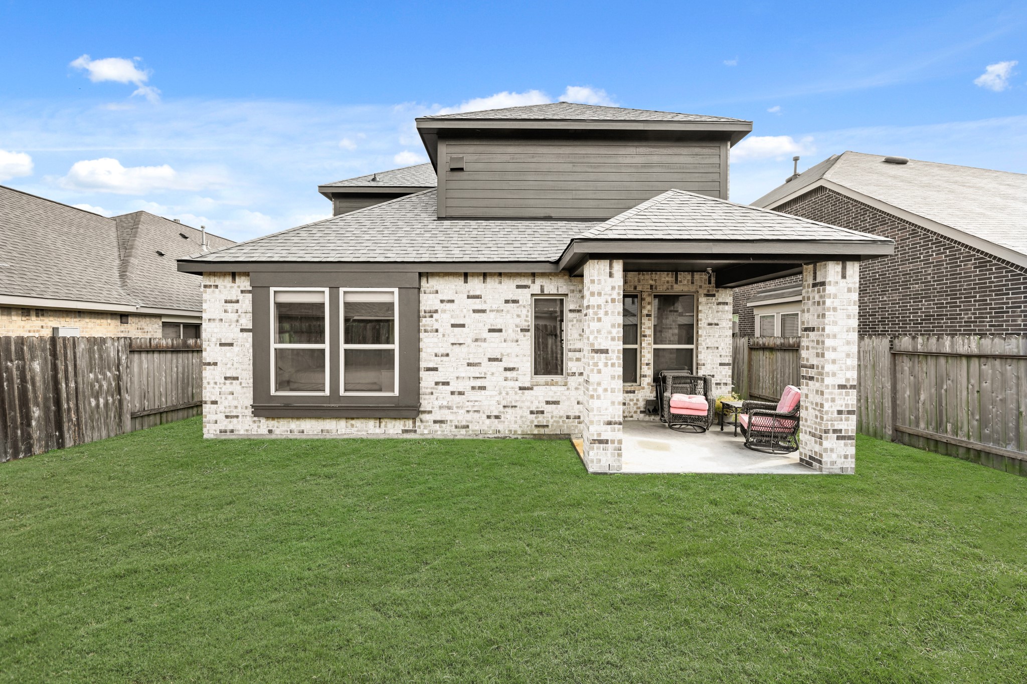 5010 Chestnut Orchard Drive Houston, TX 77066 - Photo 28 of 31 a front view of a house with a garden and patio