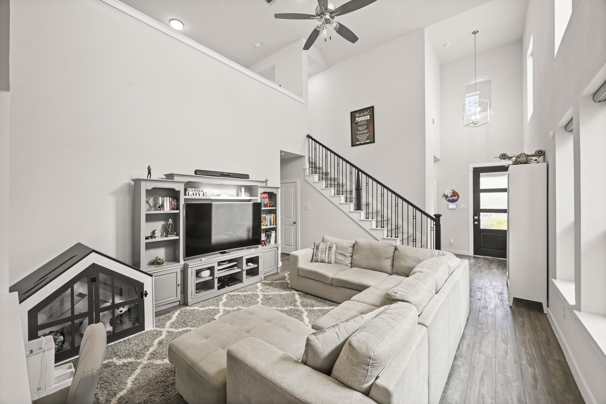 5010 Chestnut Orchard Drive Houston, TX 77066 - Photo 3 of 31 a living room with furniture and a flat screen tv