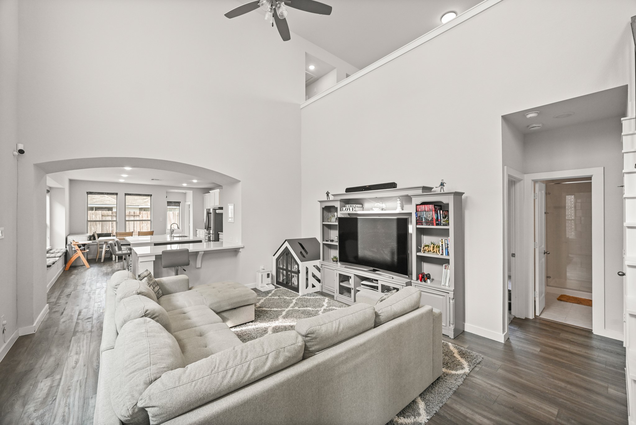 5010 Chestnut Orchard Drive Houston, TX 77066 - Photo 4 of 31 a living room with furniture and a flat screen tv