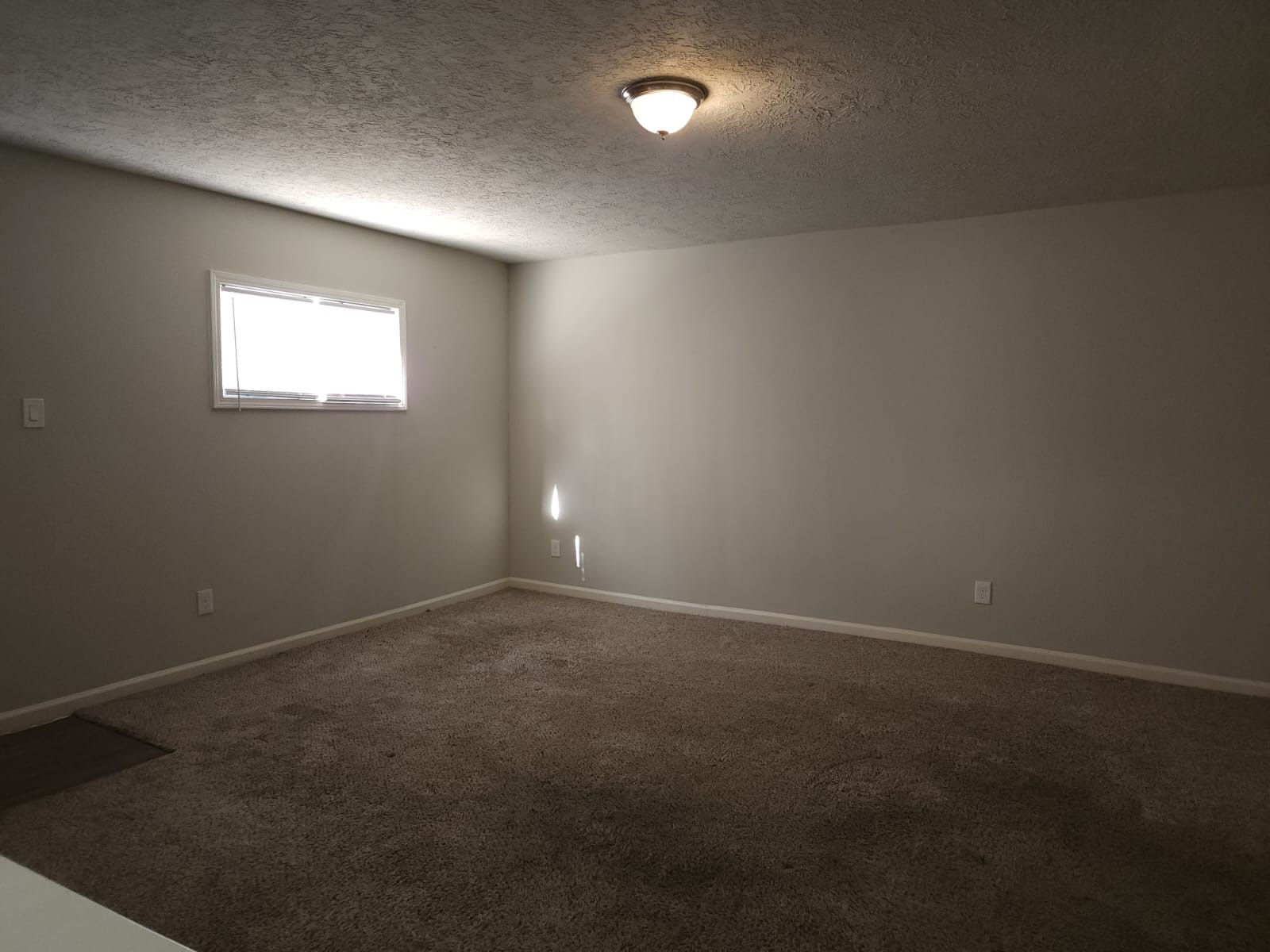 1350 Edwin Street Beaumont, TX 77705 - Photo 13 of 23 an empty room with a empty space and a window