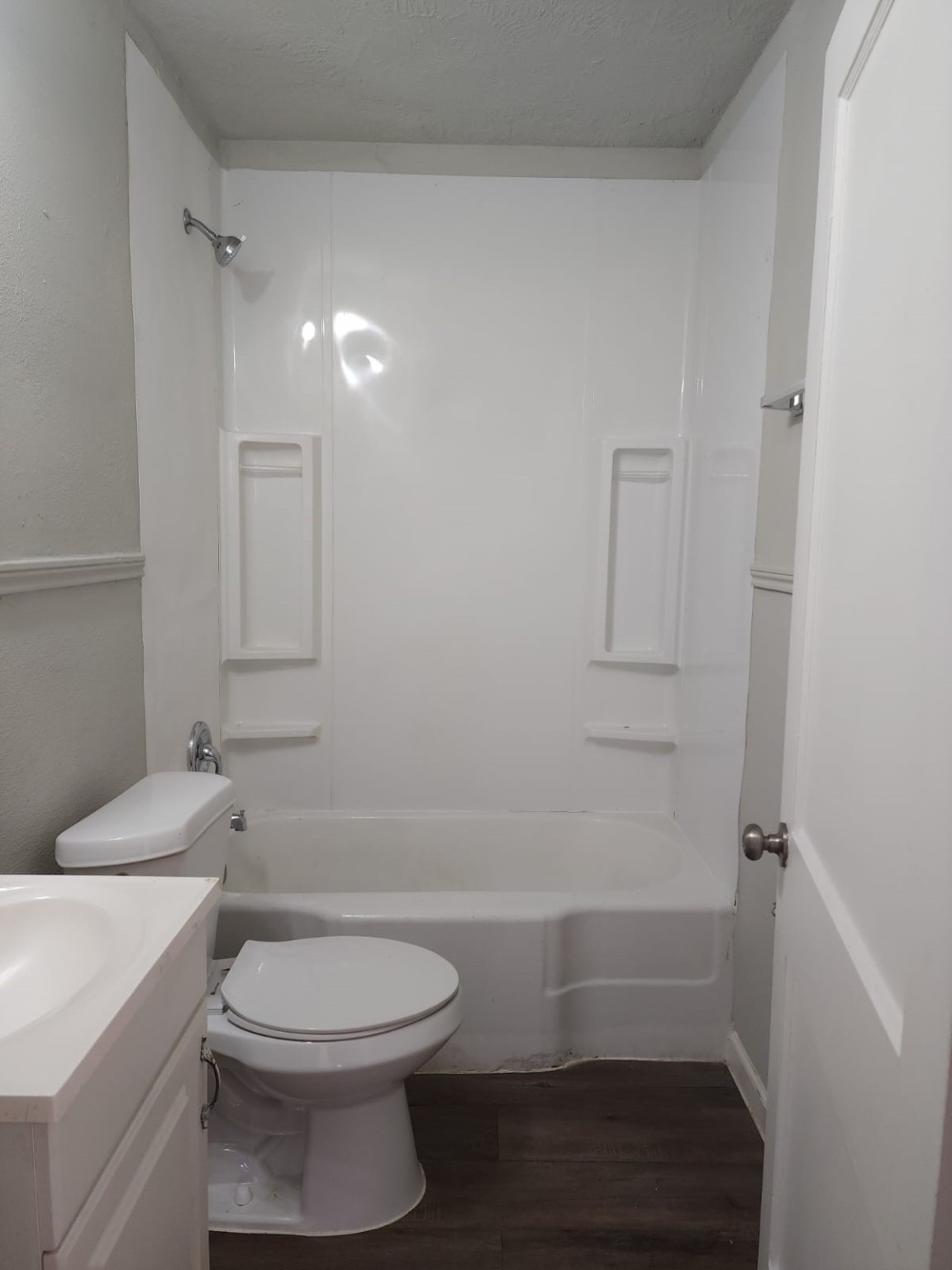 1350 Edwin Street Beaumont, TX 77705 - Photo 15 of 23 a bathroom with a toilet a sink and bathtub