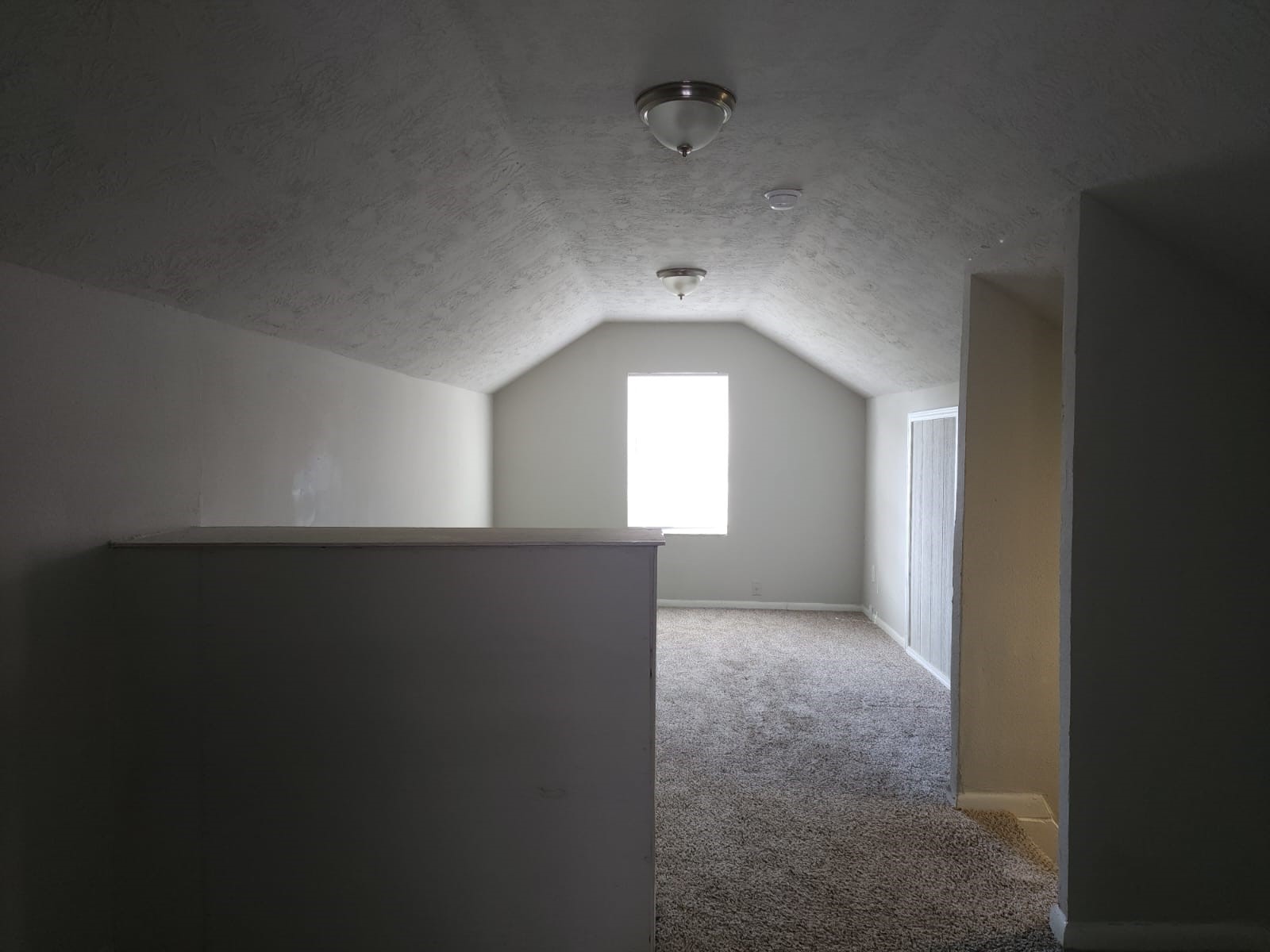 1350 Edwin Street Beaumont, TX 77705 - Photo 20 of 23 wooden floor in an empty room with a window