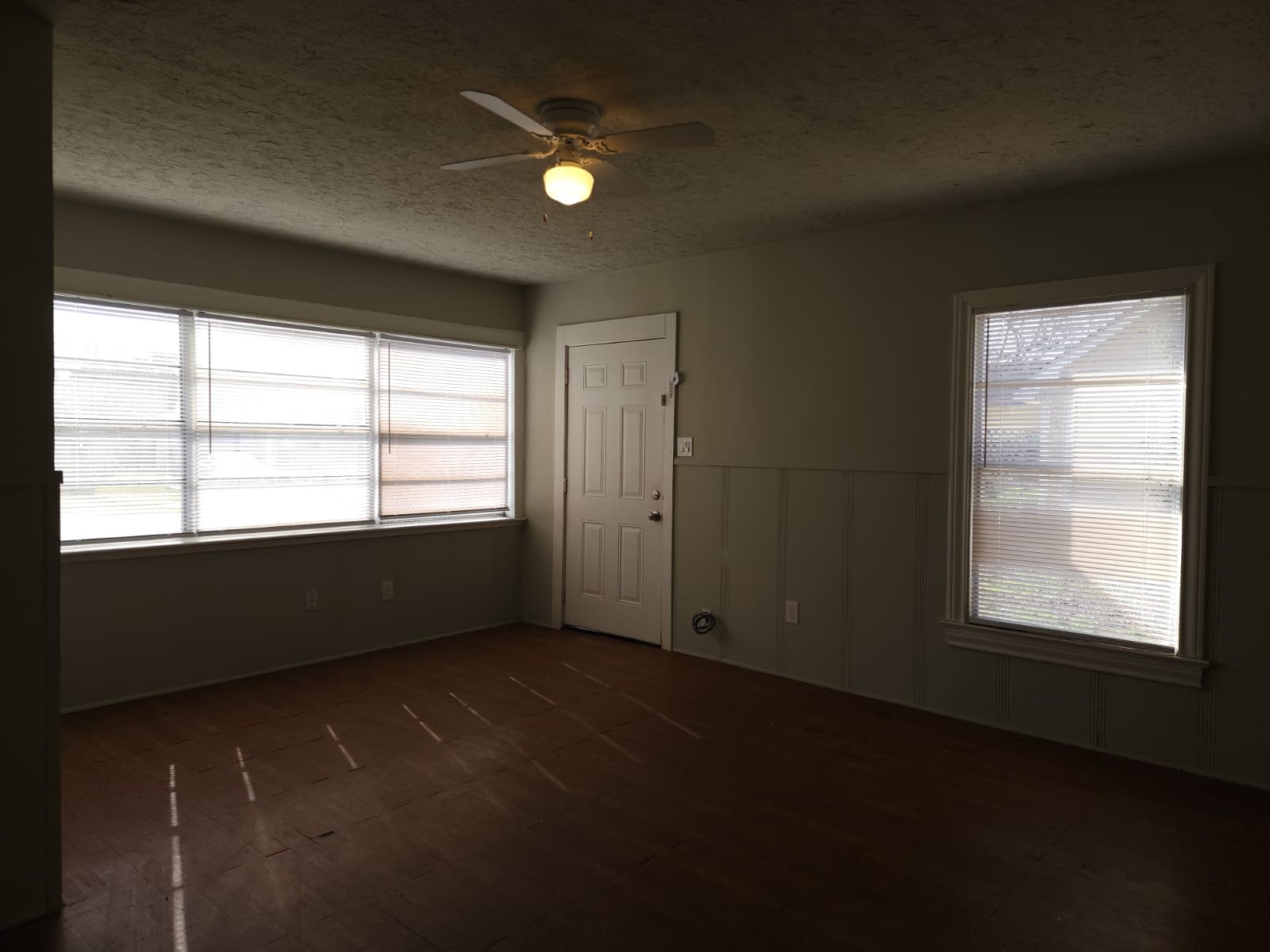 1350 Edwin Street Beaumont, TX 77705 - Photo 3 of 23 a view of an empty room with a window