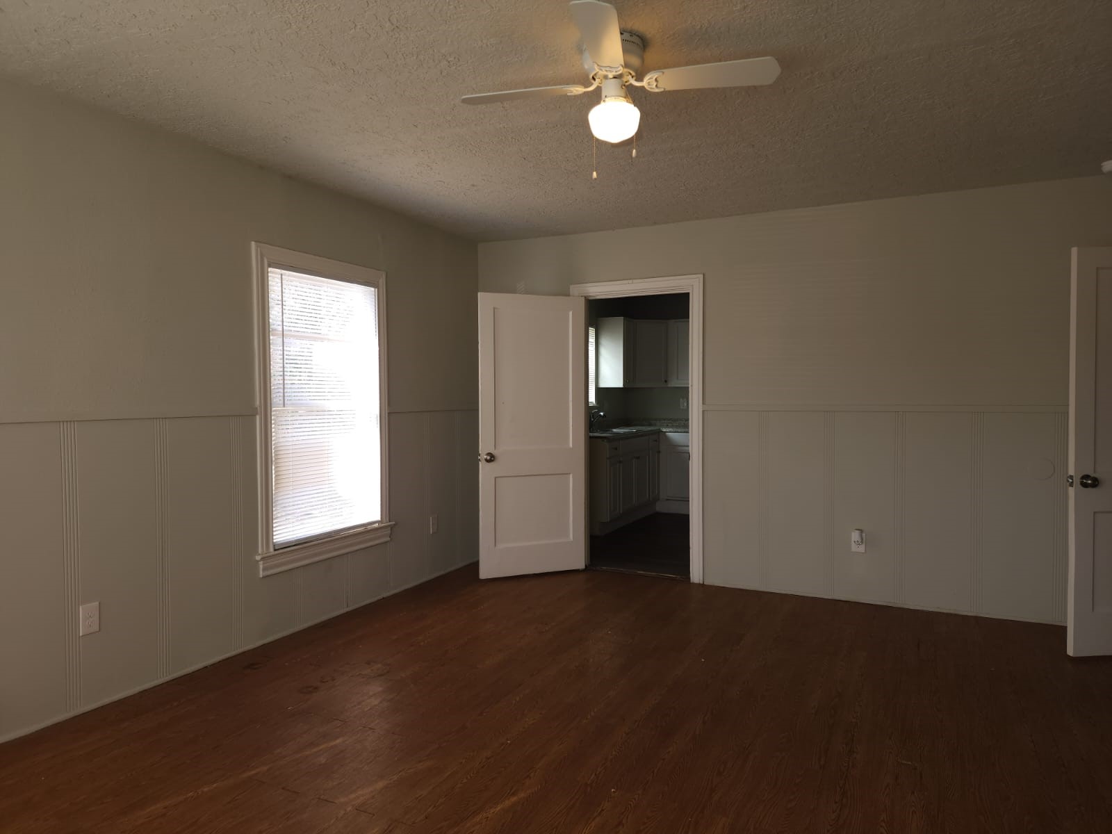 1350 Edwin Street Beaumont, TX 77705 - Photo 4 of 23 an empty room with windows and closet