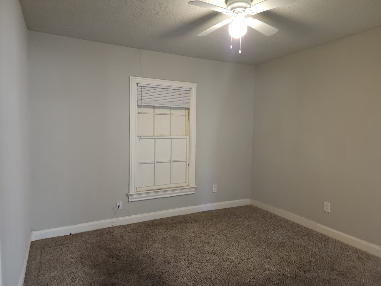 1350 Edwin Street Beaumont, TX 77705 - Photo 8 of 23 an empty room with closet and windows