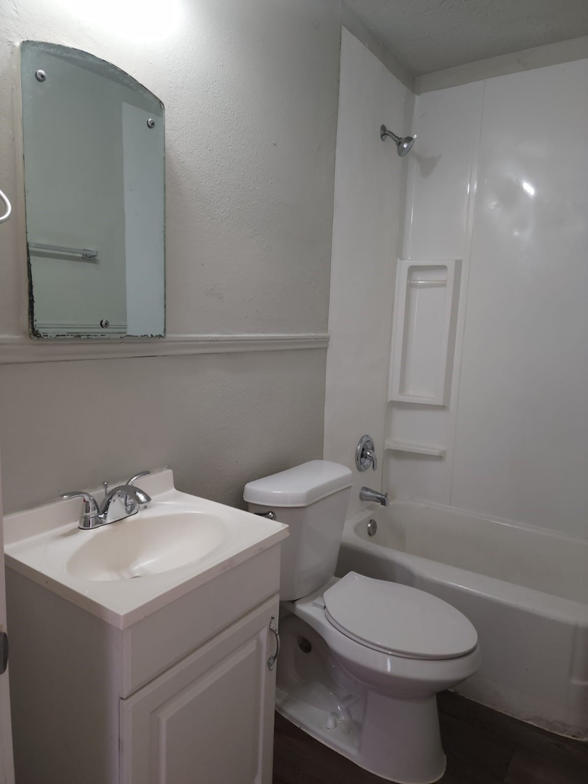 1350 Edwin Street Beaumont, TX 77705 - Photo 9 of 23 a bathroom with a sink toilet and vanity