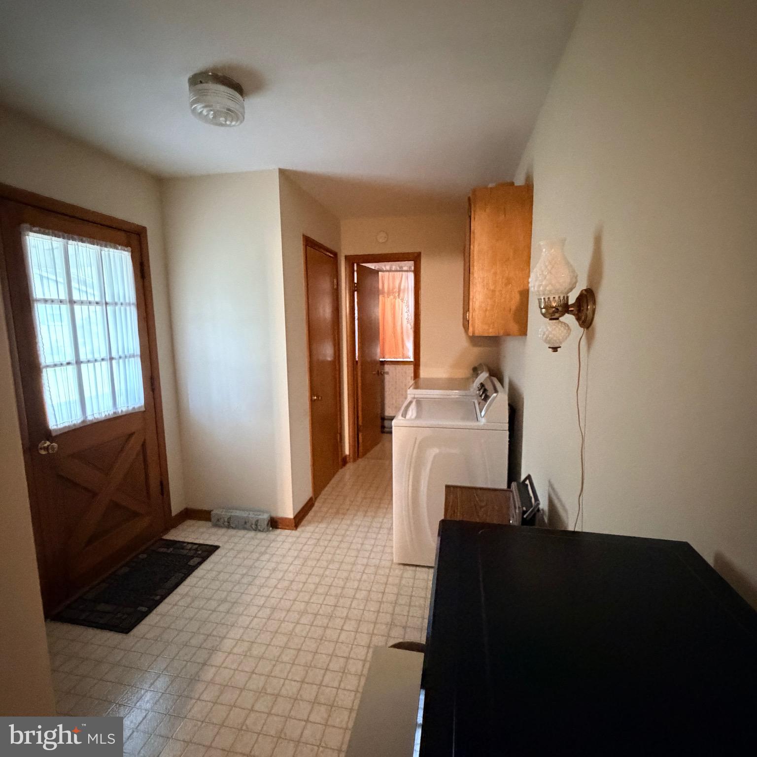 5555 Bonnie Brook Road Cambridge, MD 21613 - Photo 17 of 18 Large laundry room with half bath