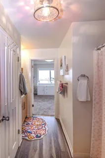 a bedroom with a bed and a dresser