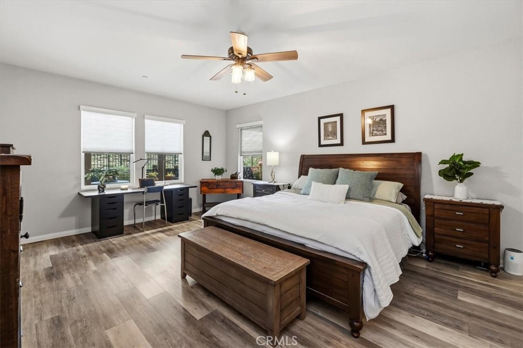 32937 Marin Fields Road Winchester, CA 92596 - Photo 20 of 47 a bedroom with a bed and a chandelier