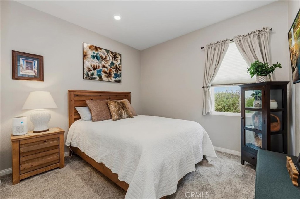 32937 Marin Fields Road Winchester, CA 92596 - Photo 23 of 47 a bedroom with a bed and a window