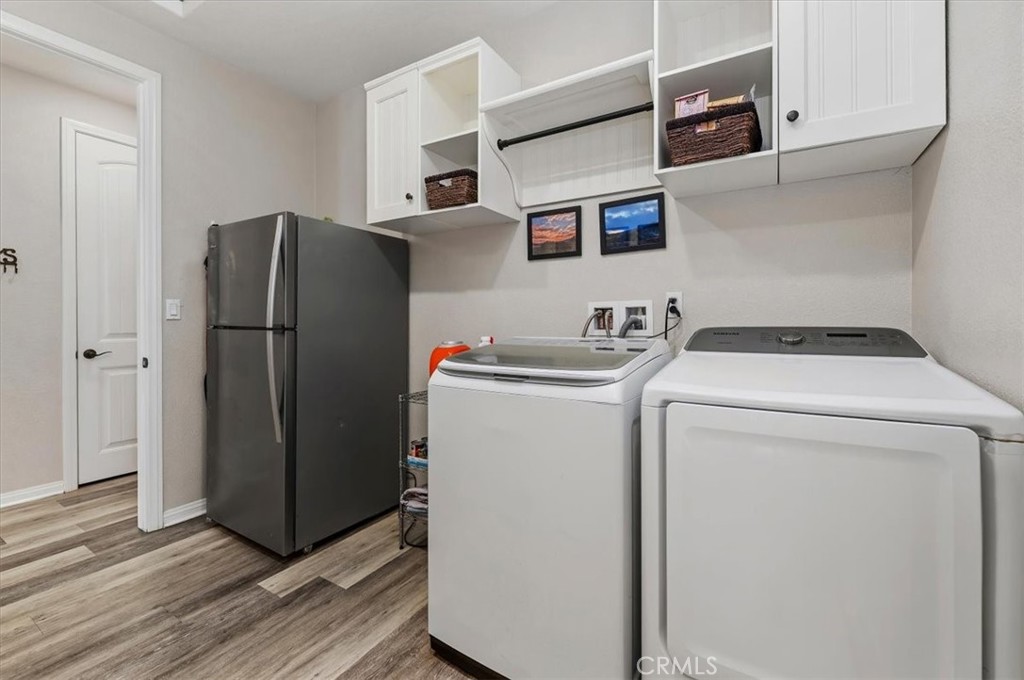 32937 Marin Fields Road Winchester, CA 92596 - Photo 30 of 47 a utility room with dryer and washer