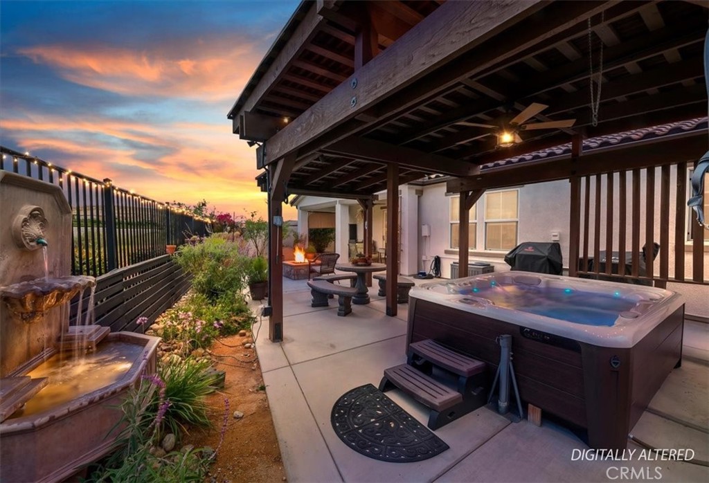 32937 Marin Fields Road Winchester, CA 92596 - Photo 31 of 47 a view of a patio with a table and chairs