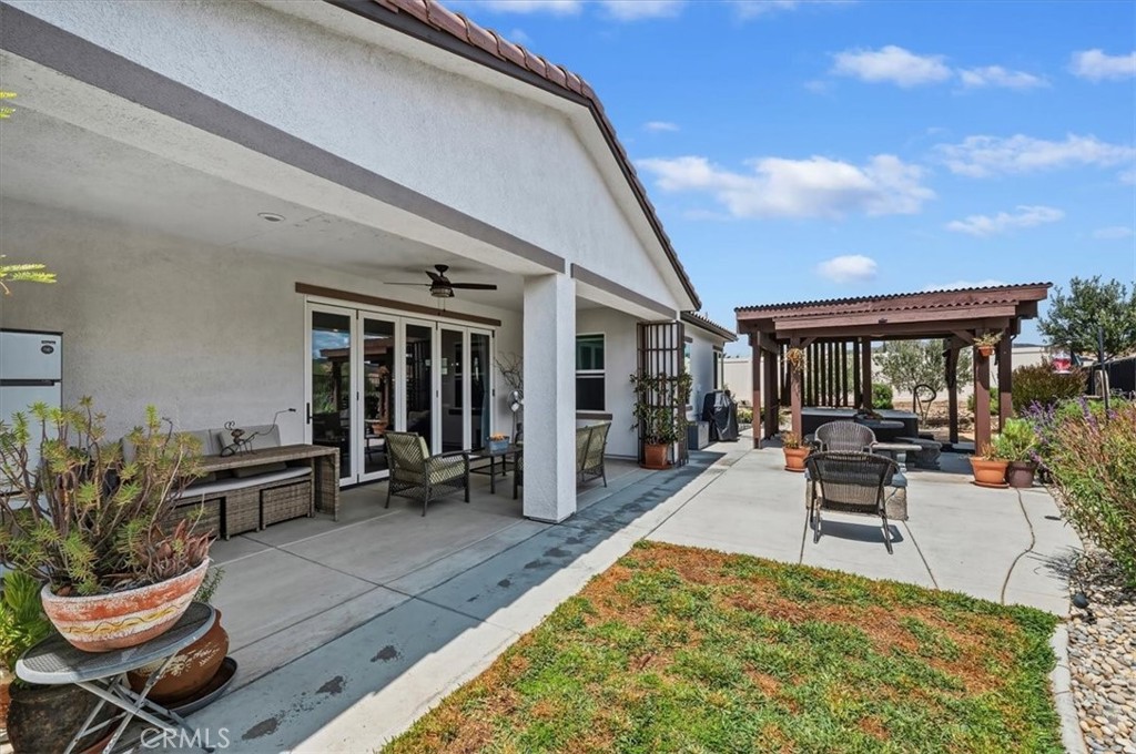 32937 Marin Fields Road Winchester, CA 92596 - Photo 34 of 47 a swimming pool with outdoor seating and plants