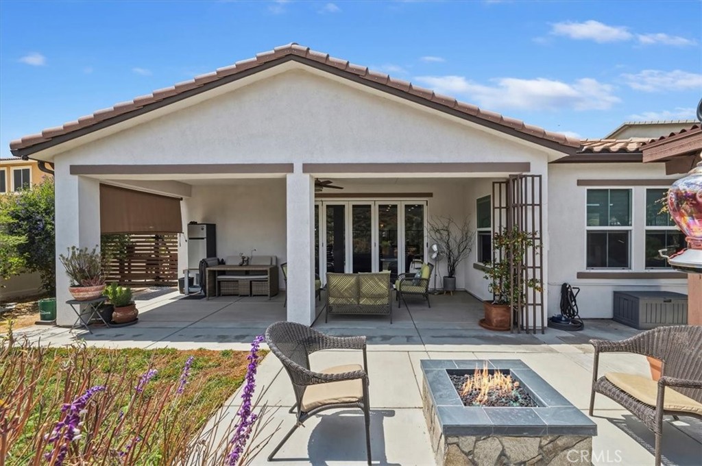 32937 Marin Fields Road Winchester, CA 92596 - Photo 36 of 47 a view of a house with backyard and sitting area