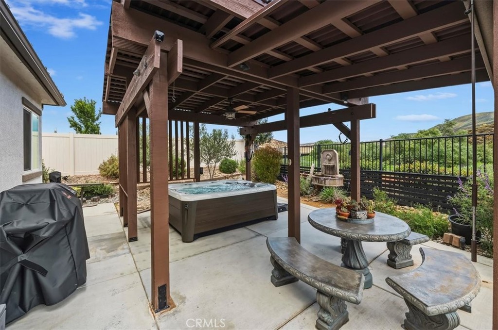 32937 Marin Fields Road Winchester, CA 92596 - Photo 42 of 47 a outdoor space with patio lots of furniture and iron fence