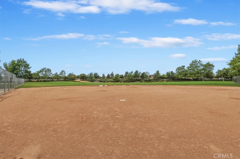 32937 Marin Fields Road Winchester, CA 92596 - Photo 45 of 47 a view of a lake with houses in the back