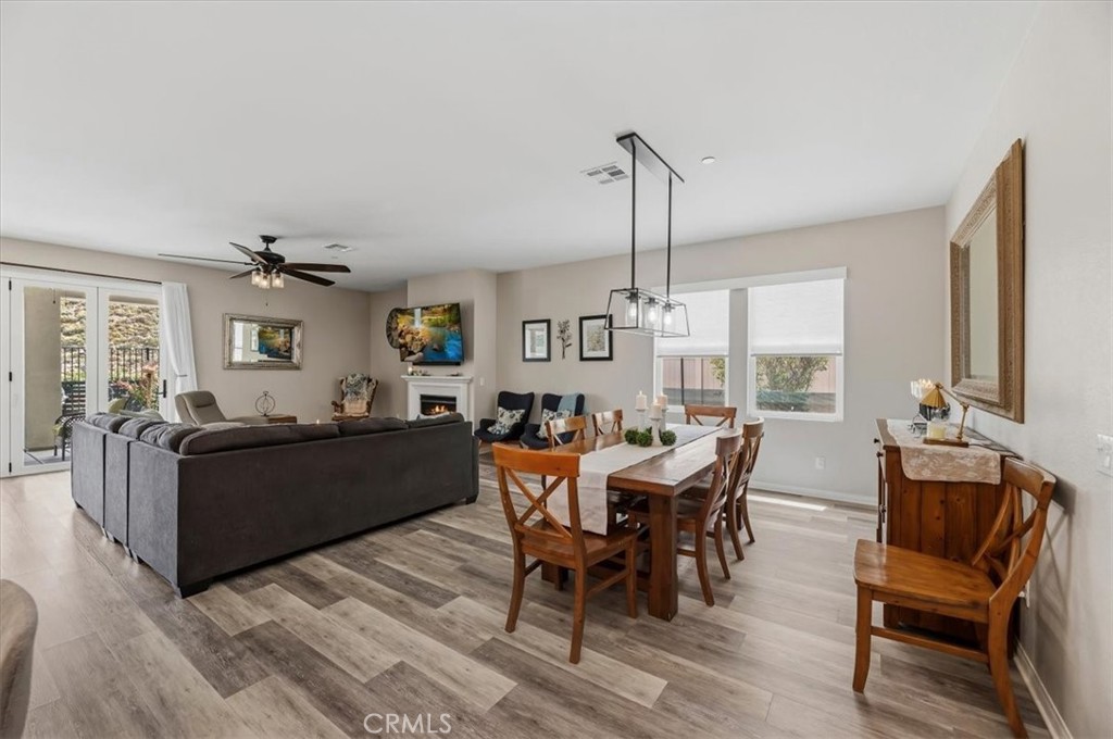 32937 Marin Fields Road Winchester, CA 92596 - Photo 10 of 47 a living room with furniture and wooden floor