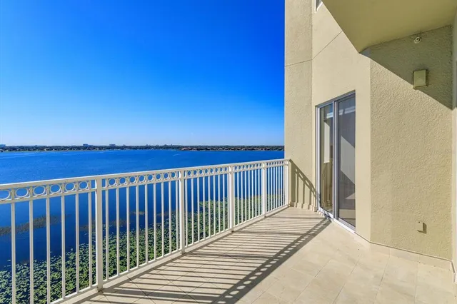 a balcony with wooden floor